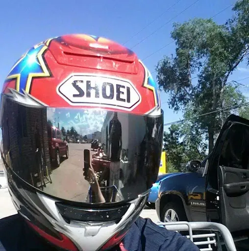 J.
